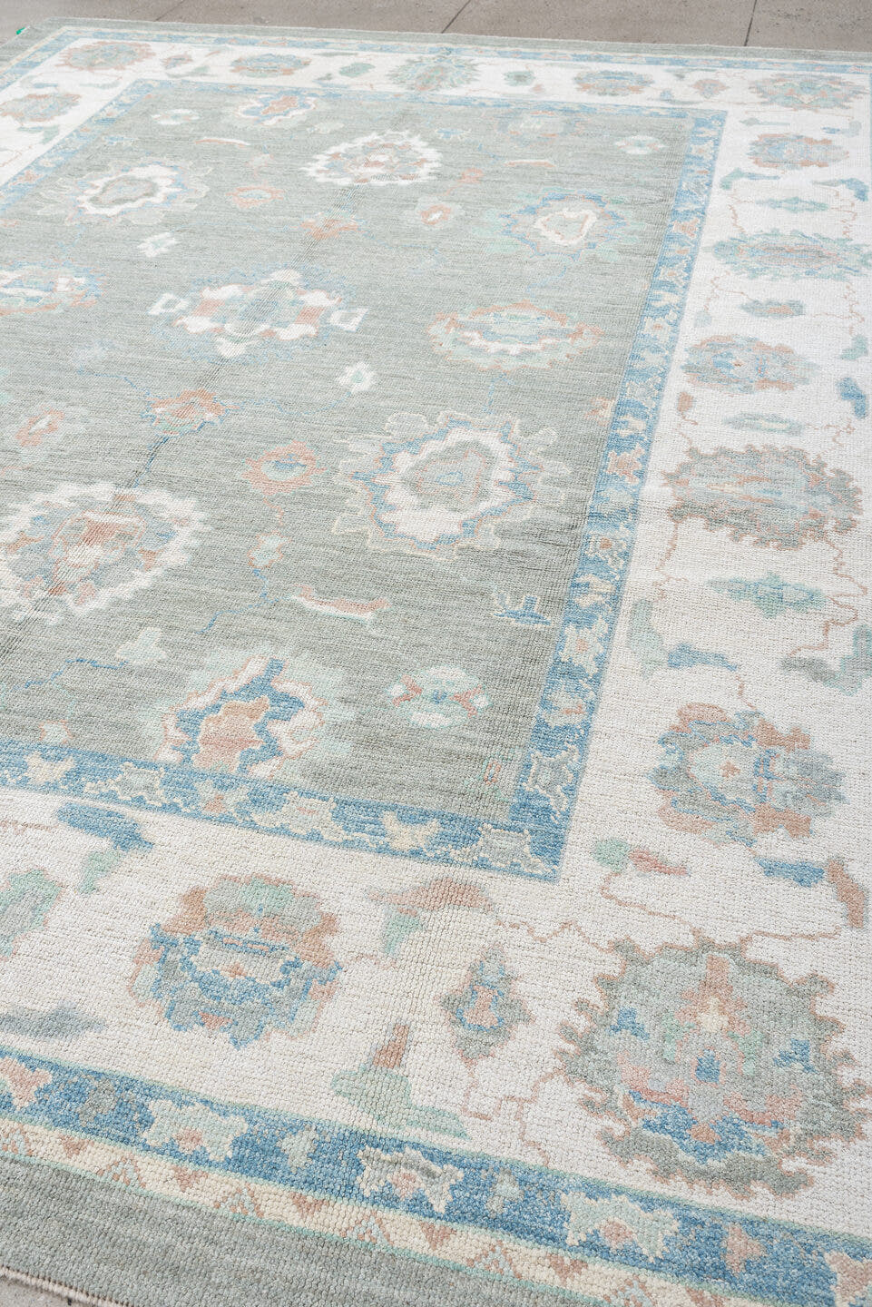 9' x 12' one-of-a-kind handmade vintage Oushak large size rug. Color palette: gray, ivory, sky blue, sage, blush, taupe