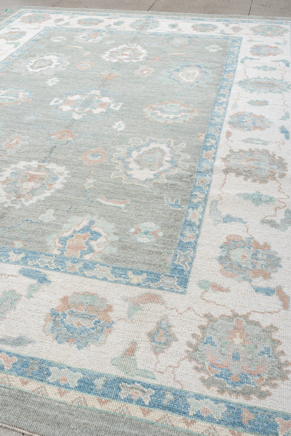 9' x 12' one-of-a-kind handmade vintage Oushak large size rug. Color palette: gray, ivory, sky blue, sage, blush, taupe