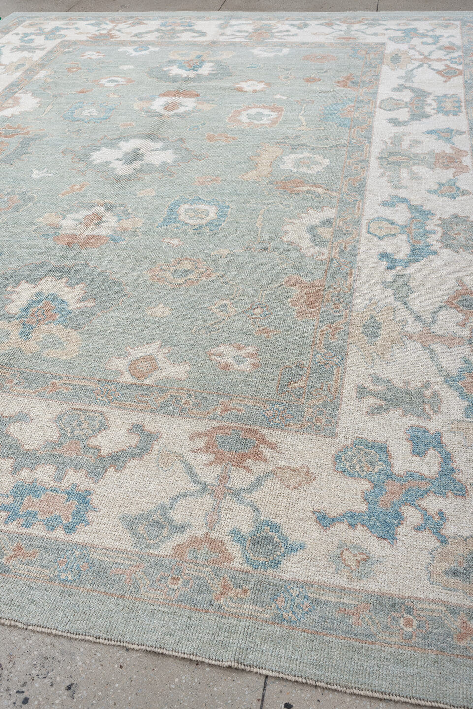 9' x 13' one-of-a-kind handmade vintage Oushak large size rug. Color palette: pale blue, ivory, taupe, blush, aqua, sage