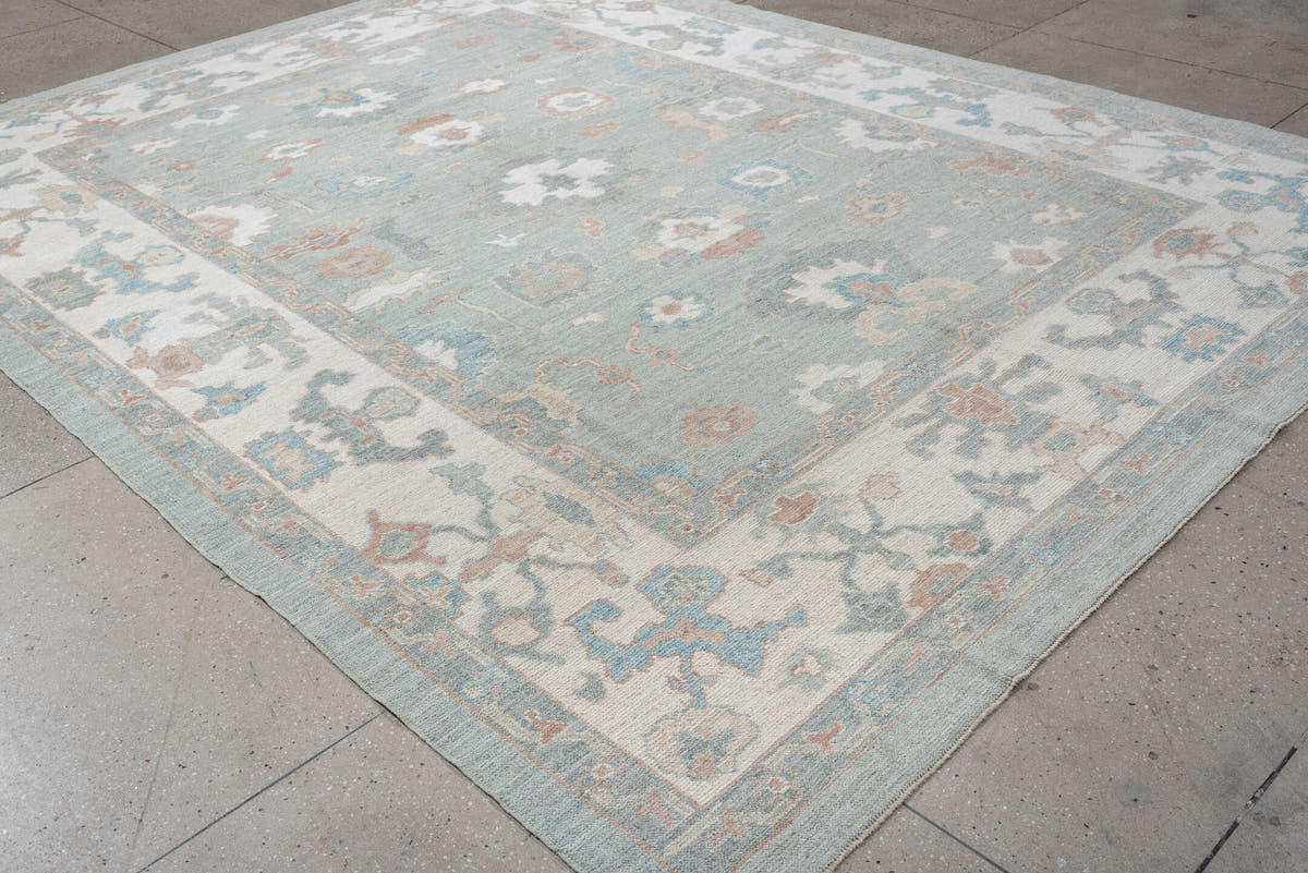 9' x 13' one-of-a-kind handmade vintage Oushak large size rug. Color palette: pale blue, ivory, taupe, blush, aqua, sage