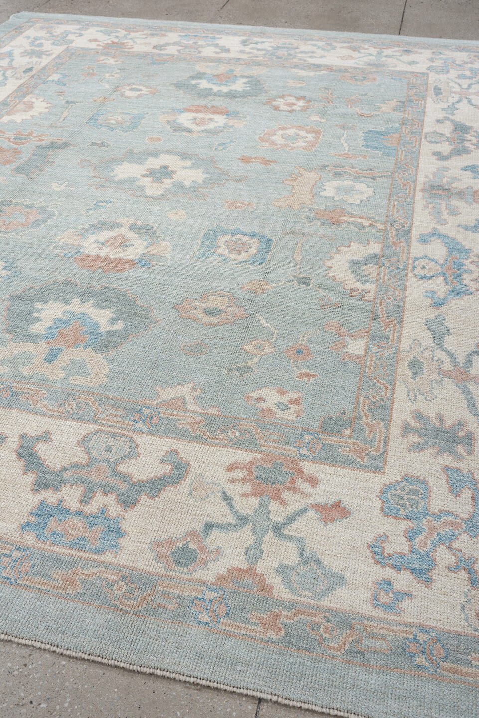 8' x 10' one-of-a-kind handmade vintage Oushak large size rug. Color palette: sky blue, ivory, blush, sage, taupe, peach