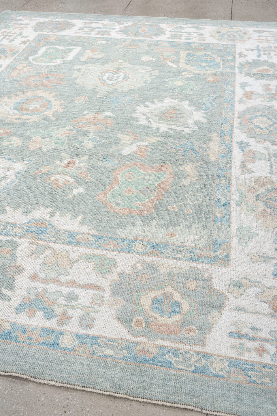 8' x 10' one-of-a-kind handmade vintage Oushak large size rug. Color palette: aqua, ivory, peach, sage, taupe, cream, teal