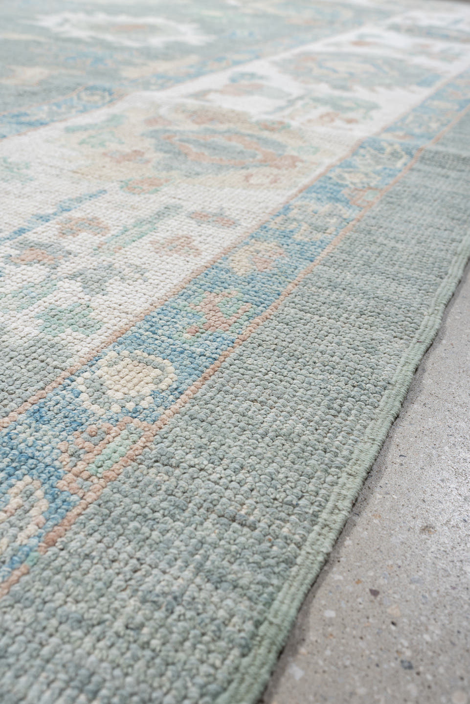 8' x 10' one-of-a-kind handmade vintage Oushak large size rug. Color palette: aqua, ivory, peach, sage, taupe, cream, teal