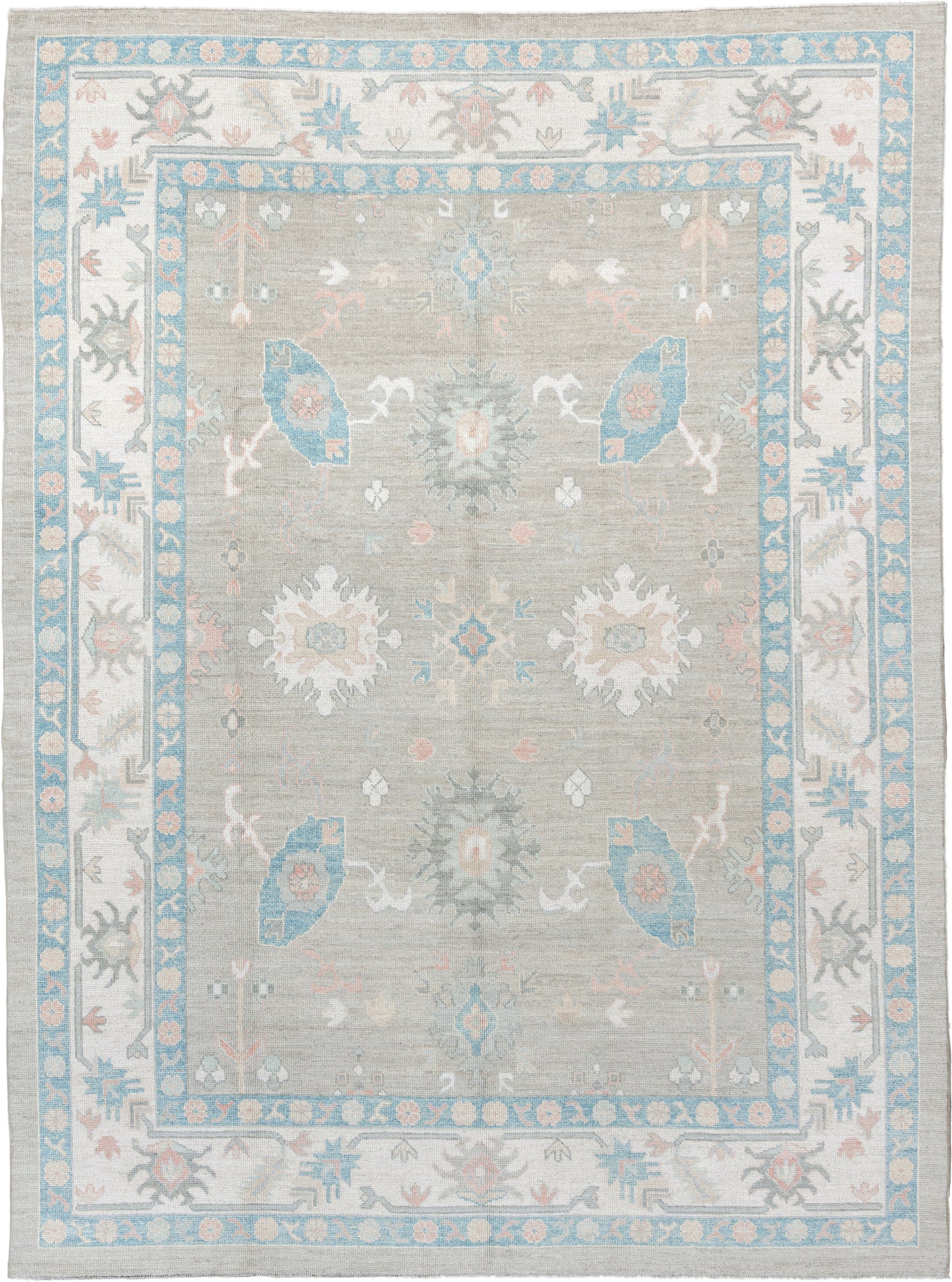 9' x 12' one-of-a-kind handmade vintage Oushak large size rug. Color palette: taupe, ivory, sky blue, peach, soft gray, sand