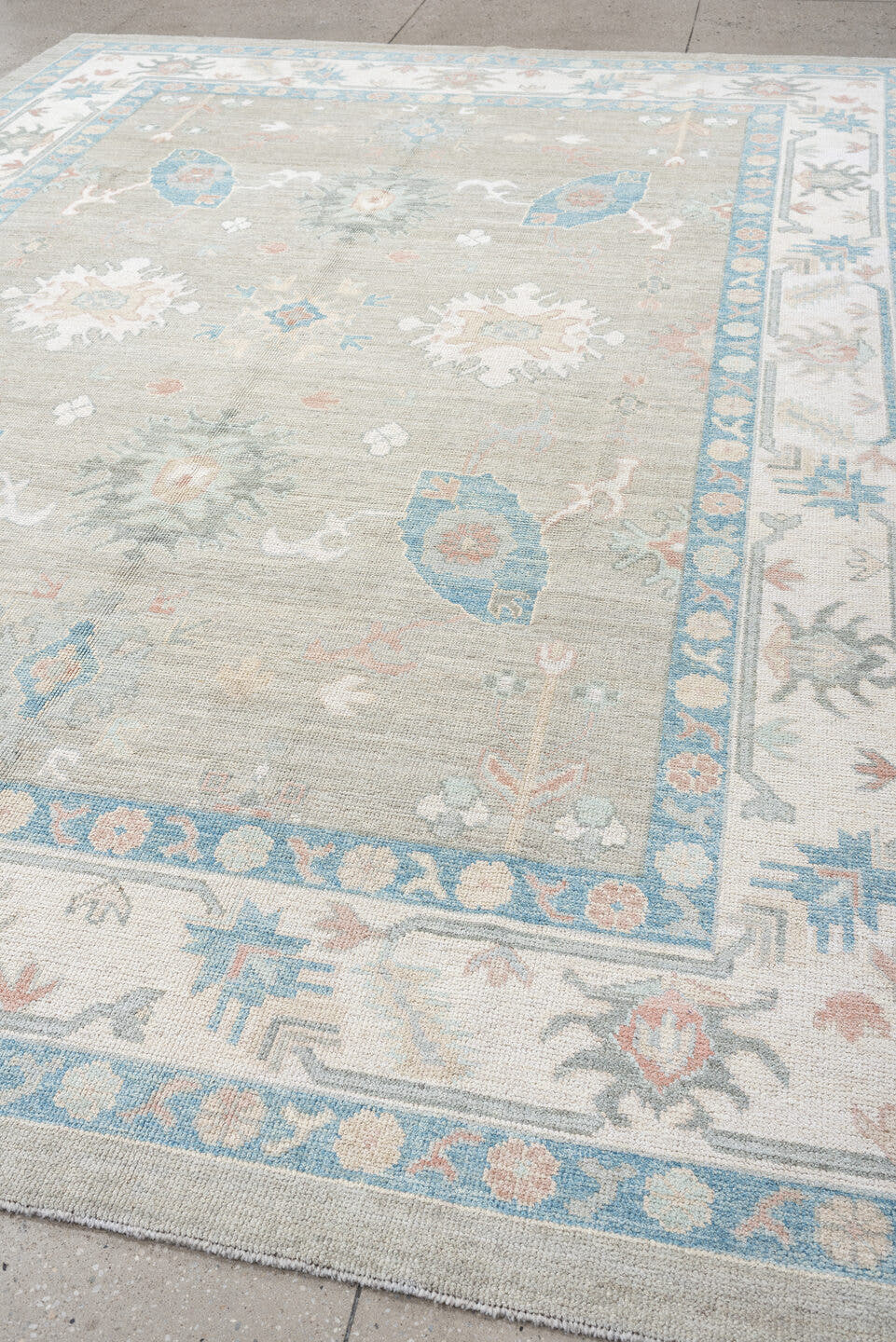 9' x 12' one-of-a-kind handmade vintage Oushak large size rug. Color palette: taupe, ivory, sky blue, peach, soft gray, sand