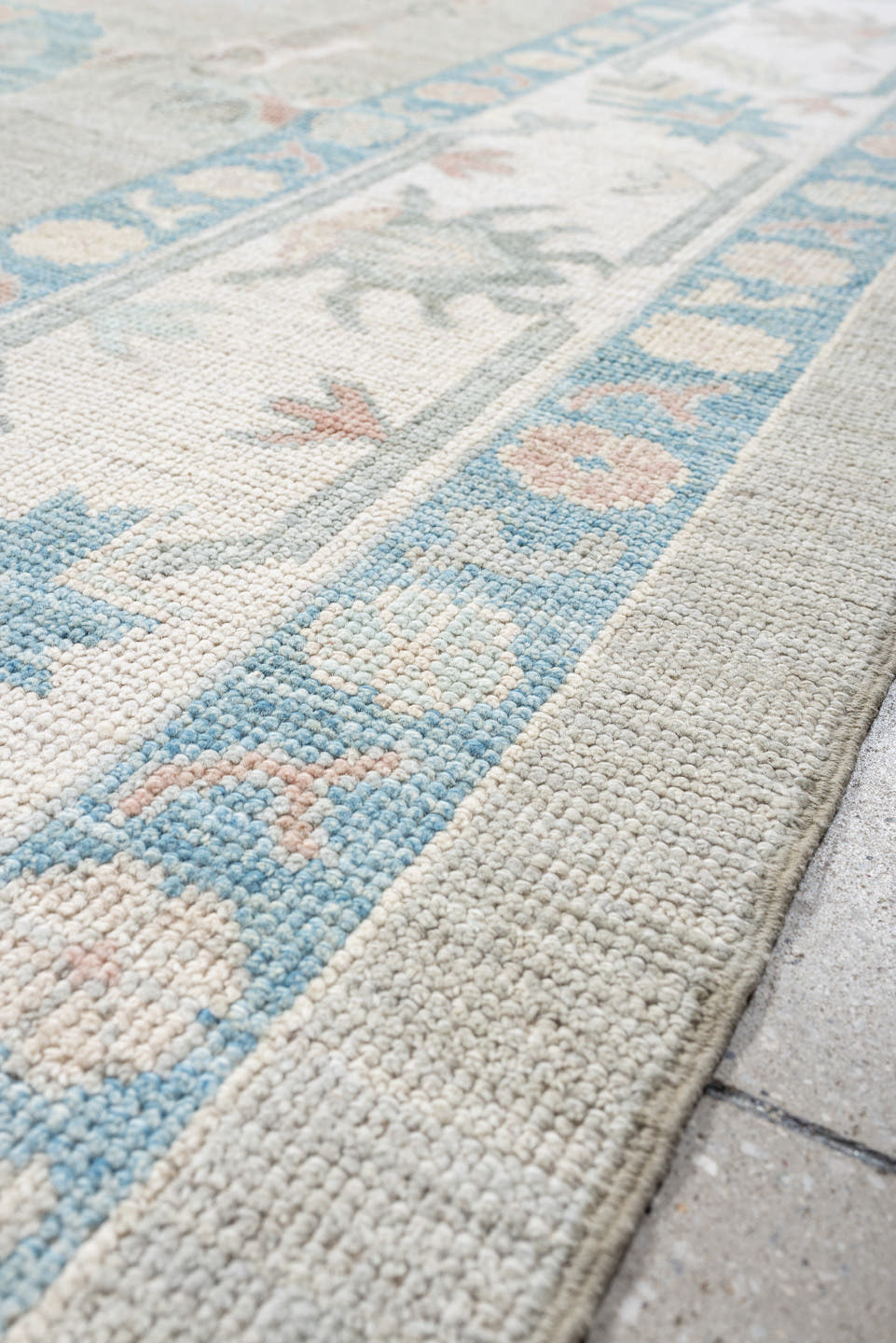 9' x 12' one-of-a-kind handmade vintage Oushak large size rug. Color palette: taupe, ivory, sky blue, peach, soft gray, sand