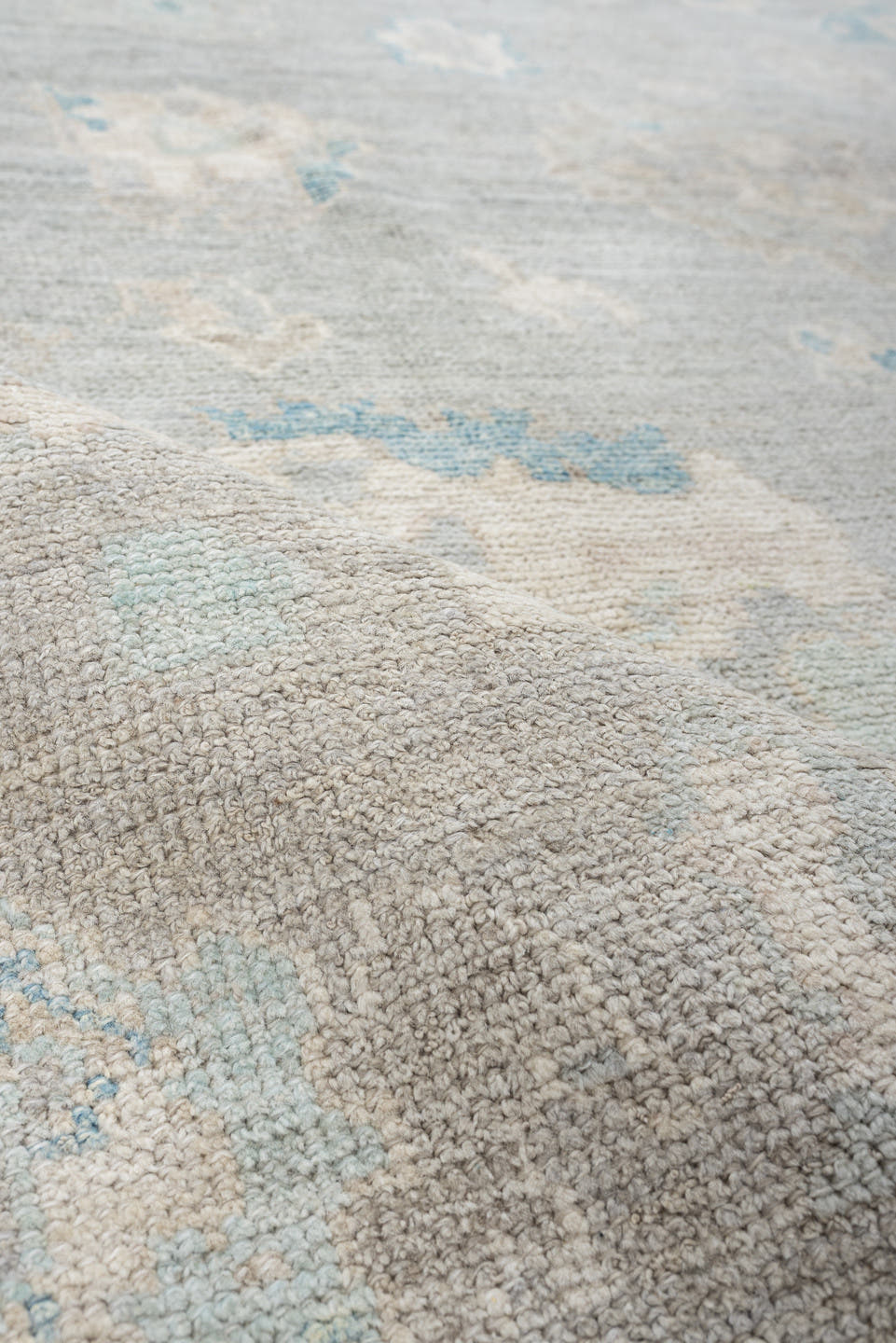 7' x 10' one-of-a-kind handmade vintage Oushak large size rug. Color palette: pale blue, ivory, taupe, cream, sky blue