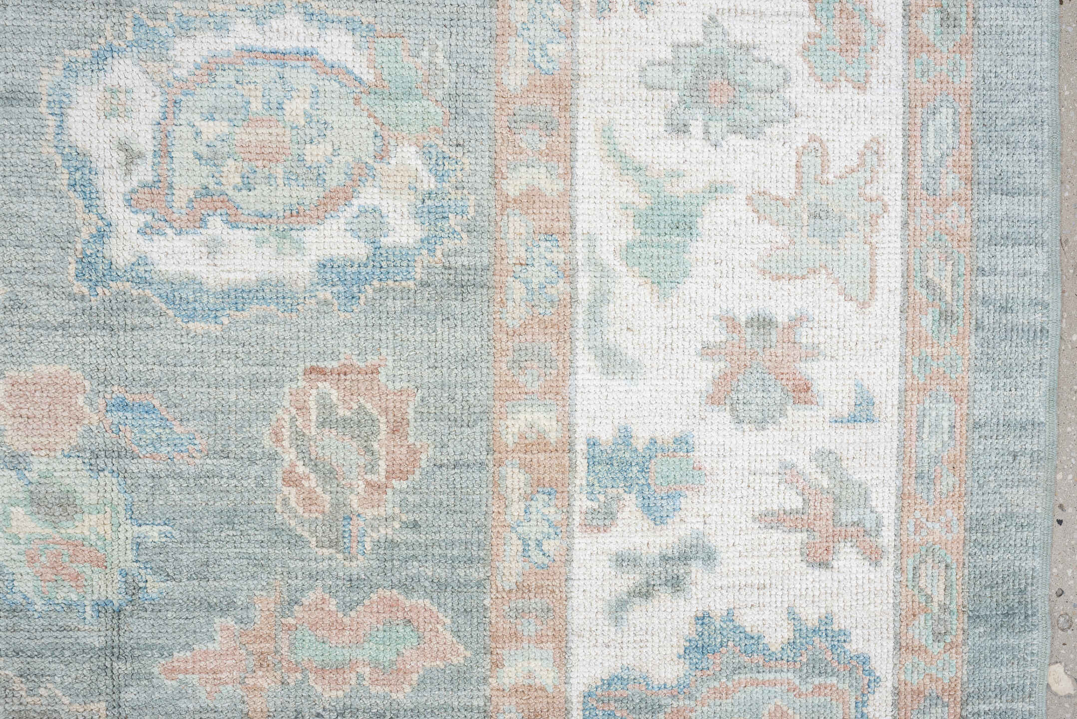8' x 10' one-of-a-kind handmade vintage Oushak large size rug. Color palette: pale aqua, ivory, peach, sage, taupe, teal