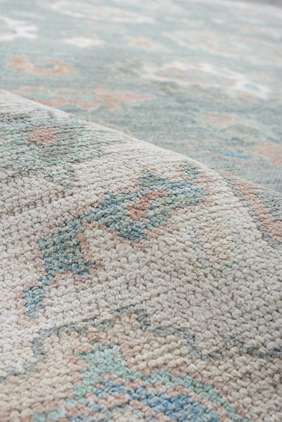 8' x 10' one-of-a-kind handmade vintage Oushak large size rug. Color palette: pale aqua, ivory, peach, sage, taupe, teal