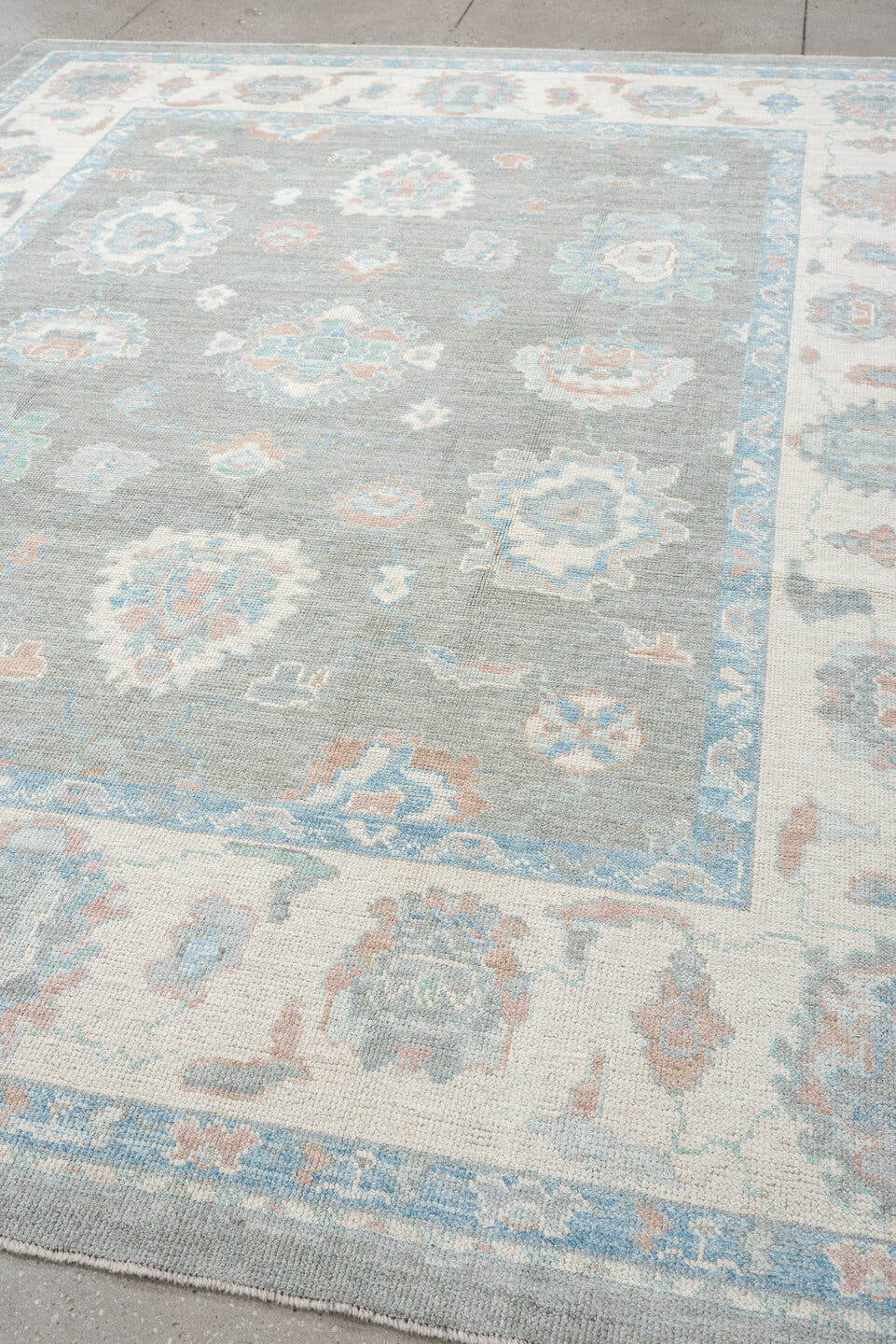 8' x 10' one-of-a-kind handmade vintage Oushak large size rug. Color palette: gray, ivory, powder blue, blush, peach, taupe