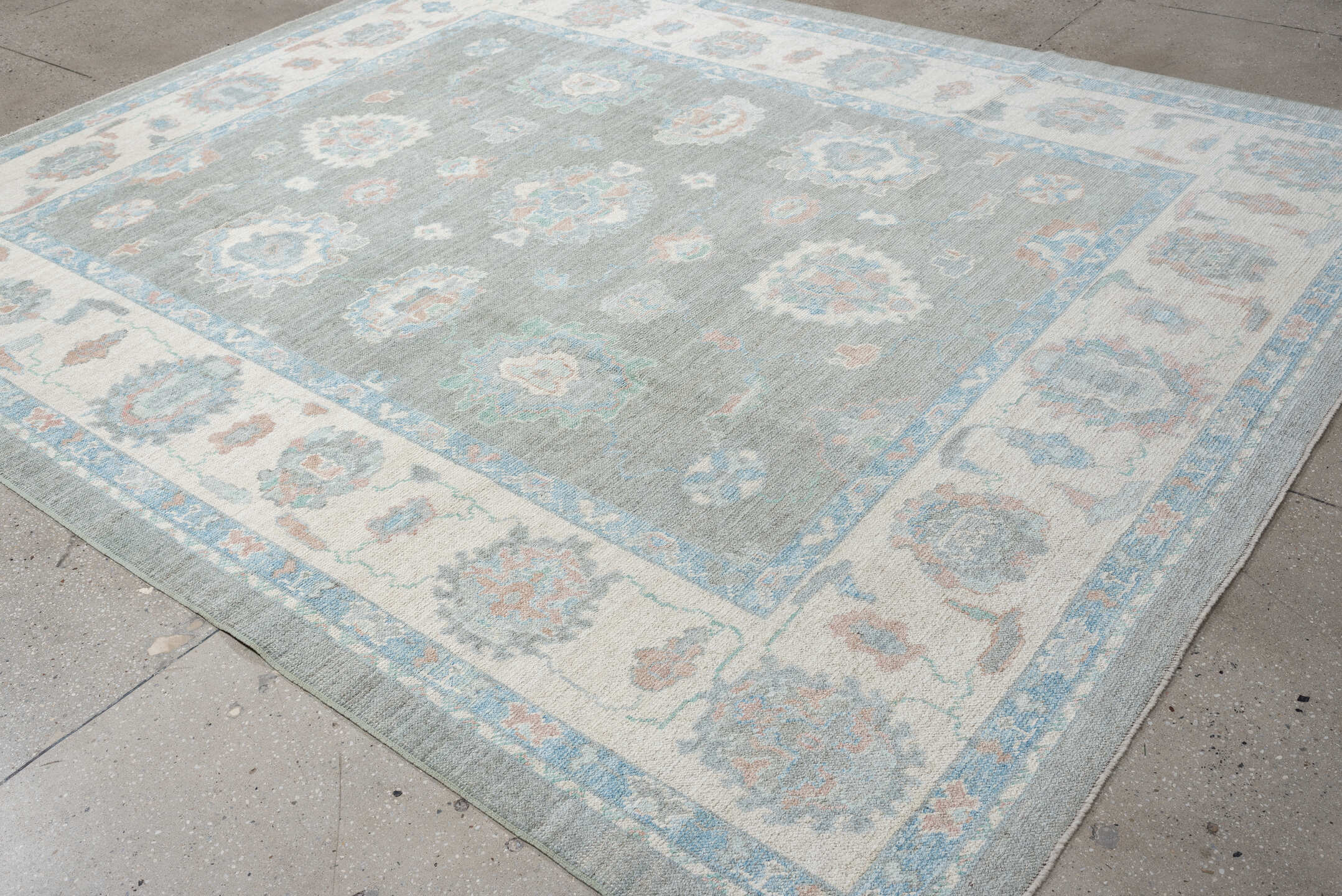 8' x 10' one-of-a-kind handmade vintage Oushak large size rug. Color palette: gray, ivory, powder blue, blush, peach, taupe