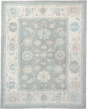 12' x 15' one-of-a-kind handmade vintage Oushak oversize rug. Color palette: pale blue, ivory, taupe, peach, sage, charcoal