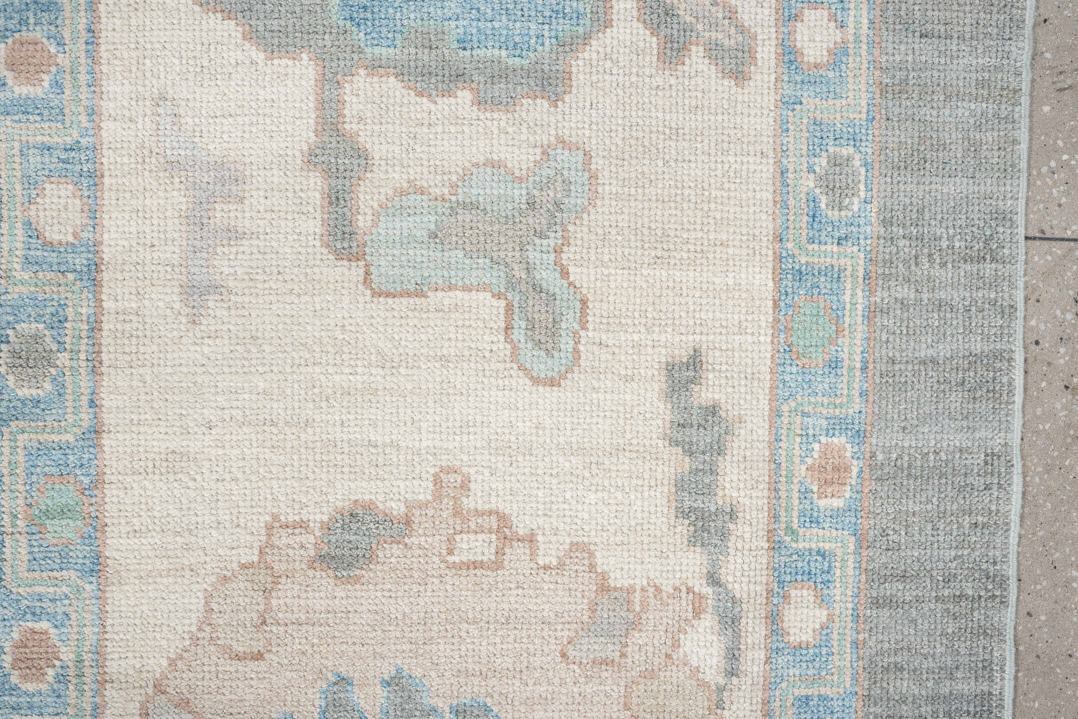 12' x 15' one-of-a-kind handmade vintage Oushak oversize rug. Color palette: pale blue, ivory, taupe, peach, sage, charcoal