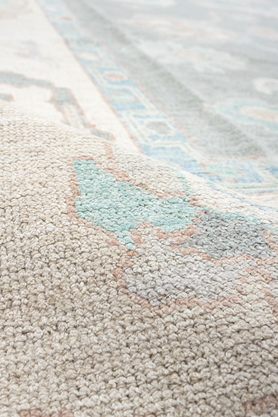 12' x 15' one-of-a-kind handmade vintage Oushak oversize rug. Color palette: pale blue, ivory, taupe, peach, sage, charcoal