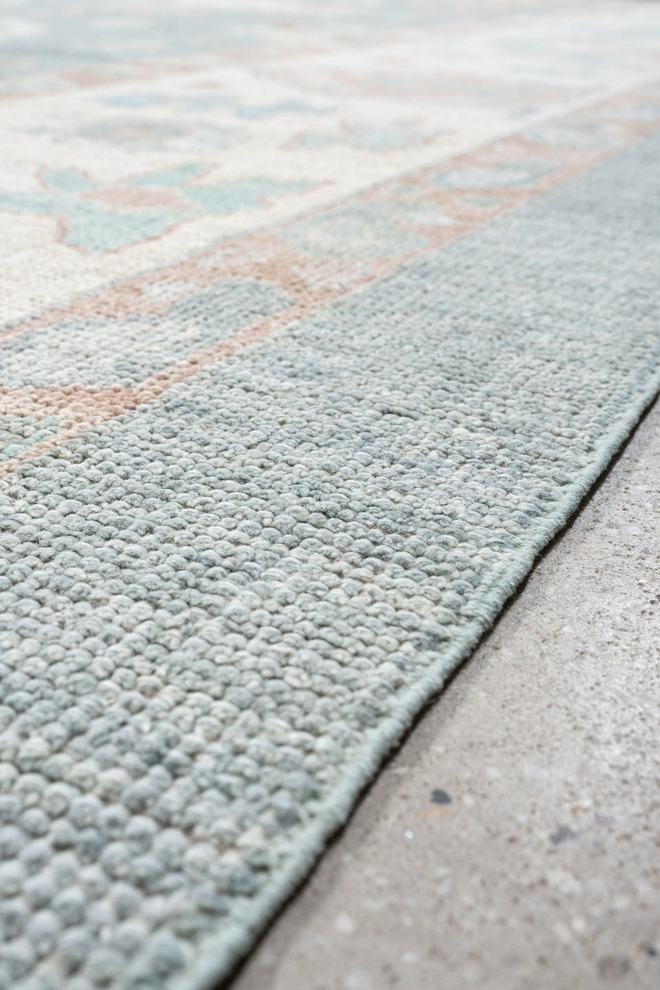 12' x 15' one-of-a-kind handmade vintage Oushak oversize rug. Color palette: sky blue, ivory, blush, pale blue, taupe, sage