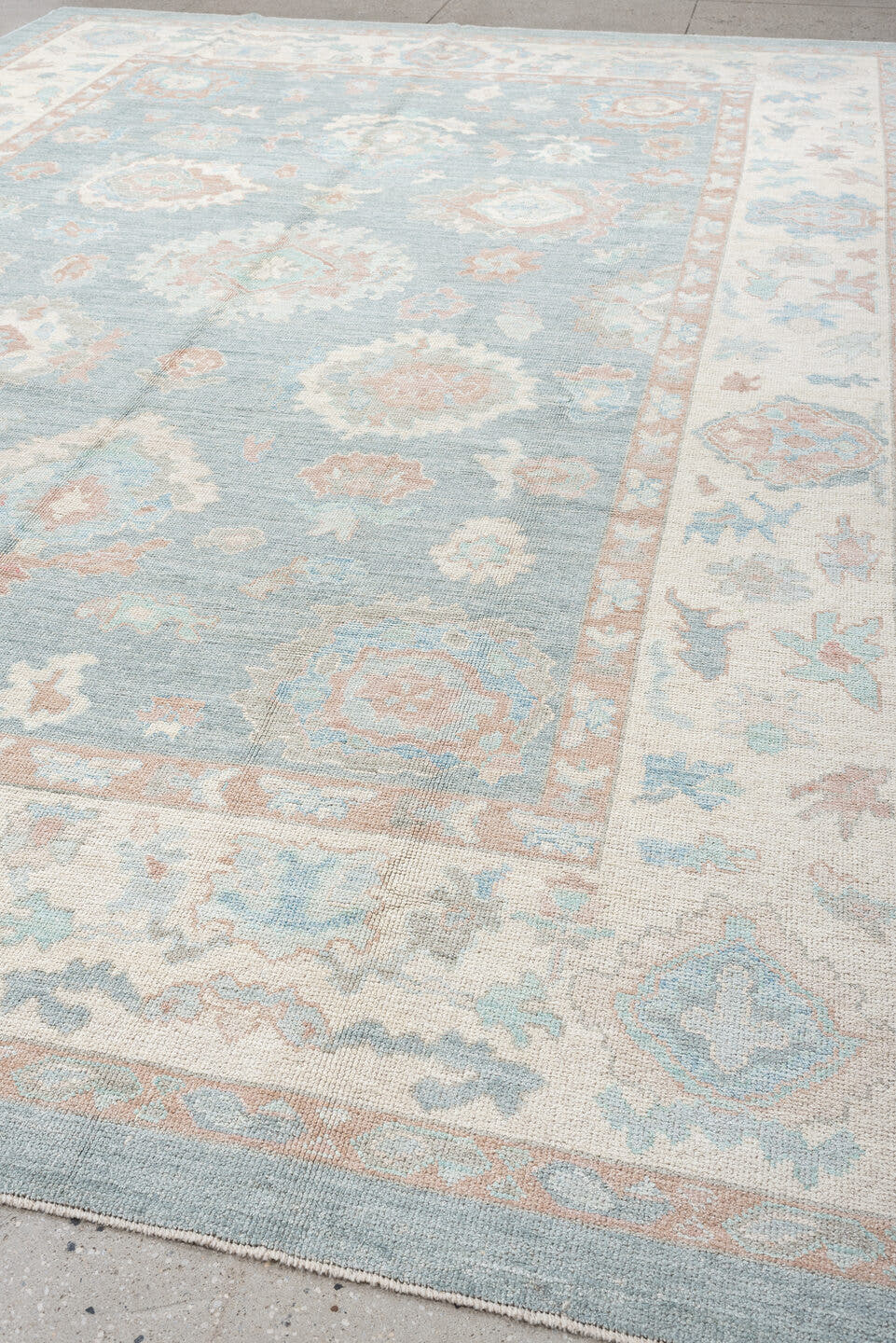 10' x 14' one-of-a-kind handmade vintage Oushak large size rug. Color palette: pale blue, ivory, blush, taupe, aqua, peach
