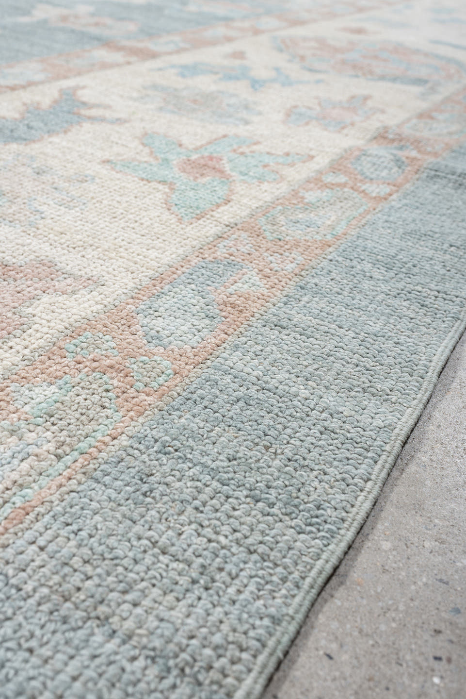 10' x 14' one-of-a-kind handmade vintage Oushak large size rug. Color palette: pale blue, ivory, blush, taupe, aqua, peach