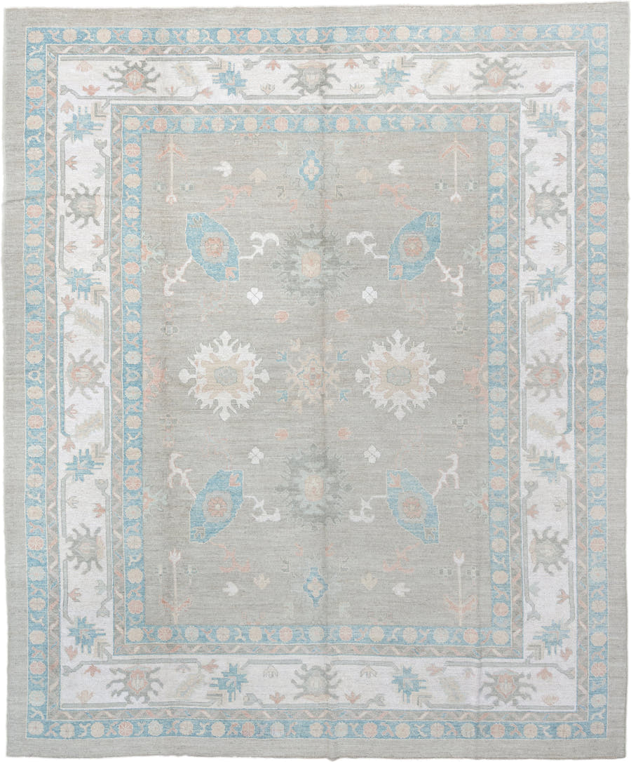 12' x 15' one-of-a-kind handmade vintage Oushak oversize rug. Color palette: pale gray, ivory, sky blue, peach, taupe, sage