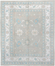 12' x 15' one-of-a-kind handmade vintage Oushak oversize rug. Color palette: pale gray, ivory, sky blue, peach, taupe, sage