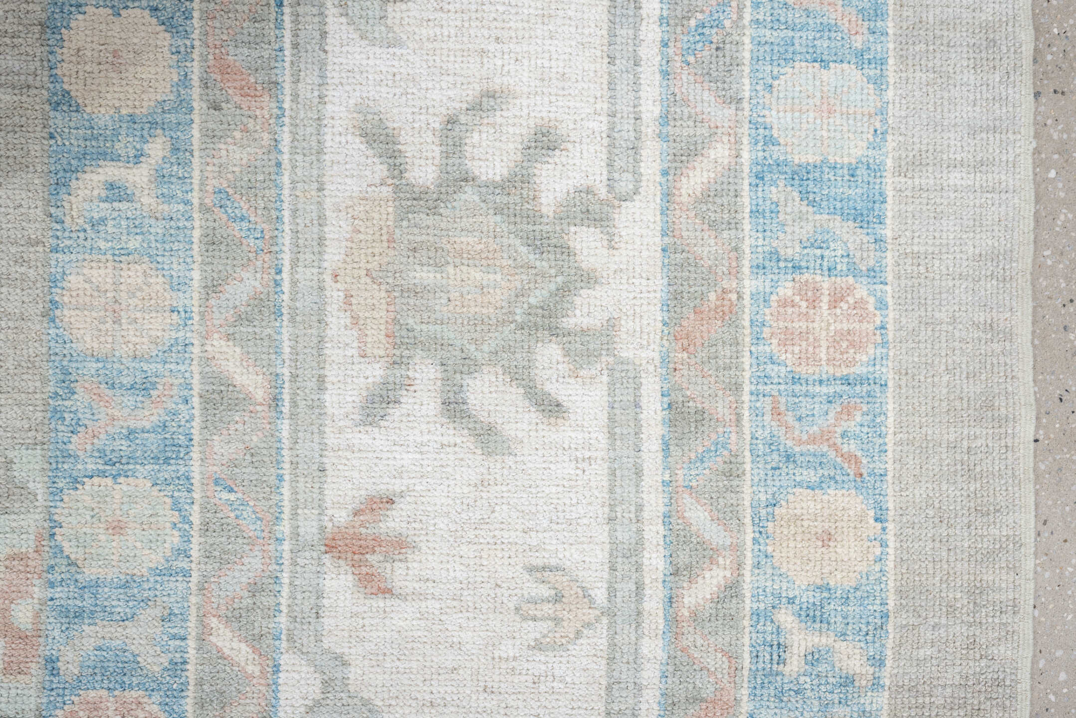 12' x 15' one-of-a-kind handmade vintage Oushak oversize rug. Color palette: pale gray, ivory, sky blue, peach, taupe, sage
