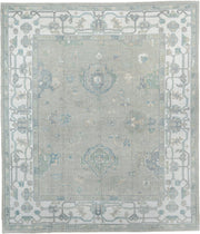 8' x 9' one-of-a-kind handmade vintage Oushak large size rug. Color palette: taupe, ivory, sky blue, sage, soft gold