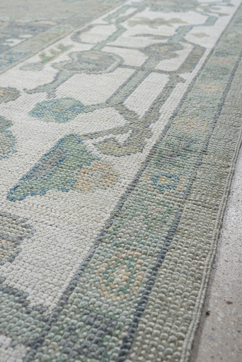 8' x 9' one-of-a-kind handmade vintage Oushak large size rug. Color palette: taupe, ivory, sky blue, sage, soft gold