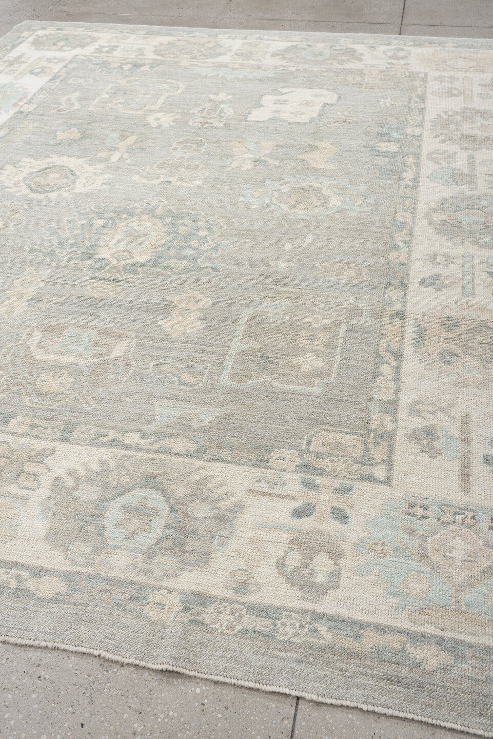 8' x 10' one-of-a-kind handmade vintage Oushak large size rug. Color palette: pale blue, ivory, taupe, cream, sage, beige