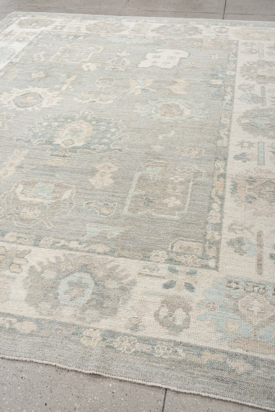 8' x 10' one-of-a-kind handmade vintage Oushak large size rug. Color palette: pale blue, ivory, taupe, cream, sage, beige