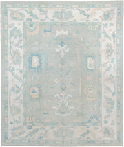 8' x 10' one-of-a-kind handmade vintage Oushak large size rug. Color palette: pale aqua, ivory, sky blue, taupe, cream, sage