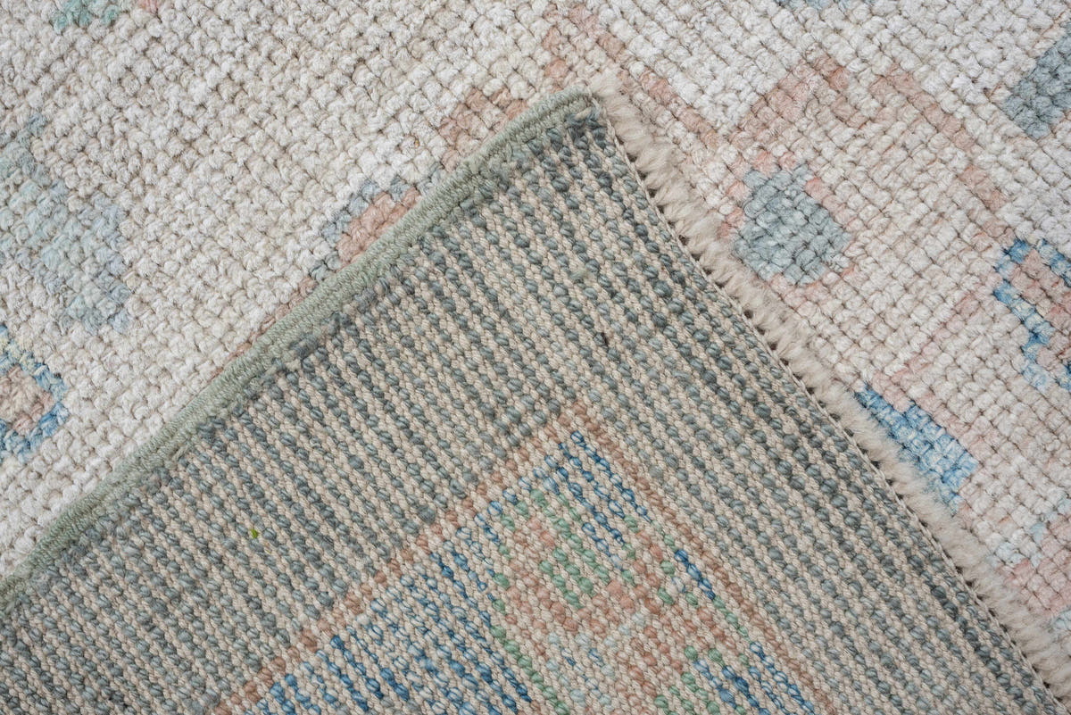 7' x 10' one-of-a-kind handmade vintage Oushak large size rug. Color palette: pale blue, ivory, sage, blush, taupe