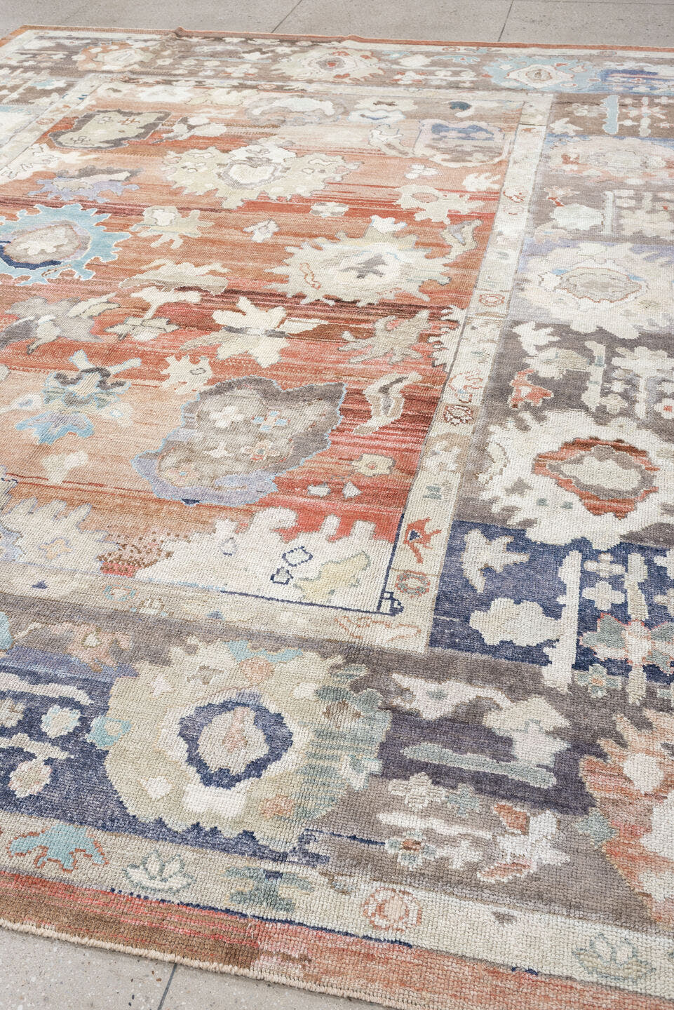 9' x 11' one-of-a-kind handmade vintage Oushak large size rug. Color palette: terracotta, taupe, ivory, cream, powder blue