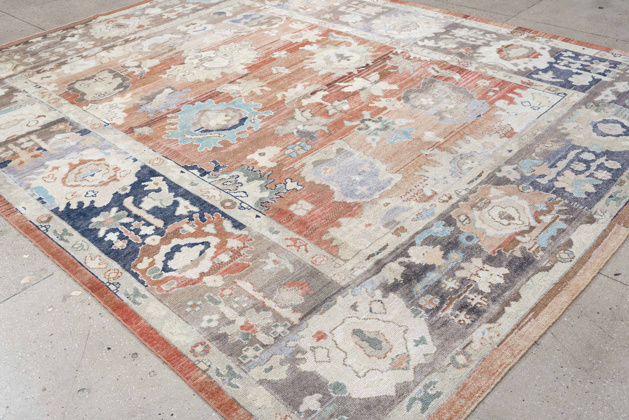 9' x 11' one-of-a-kind handmade vintage Oushak large size rug. Color palette: terracotta, taupe, ivory, cream, powder blue