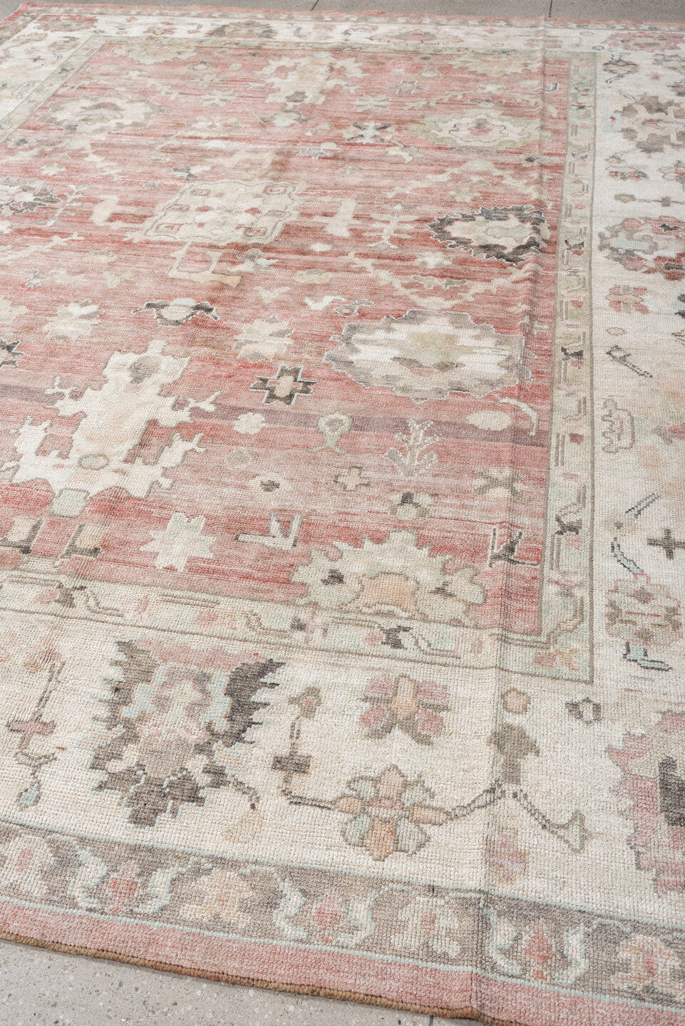 9' x 11' one-of-a-kind handmade vintage Oushak large size rug. Color palette: coral, ivory, sage, taupe, blush, charcoal