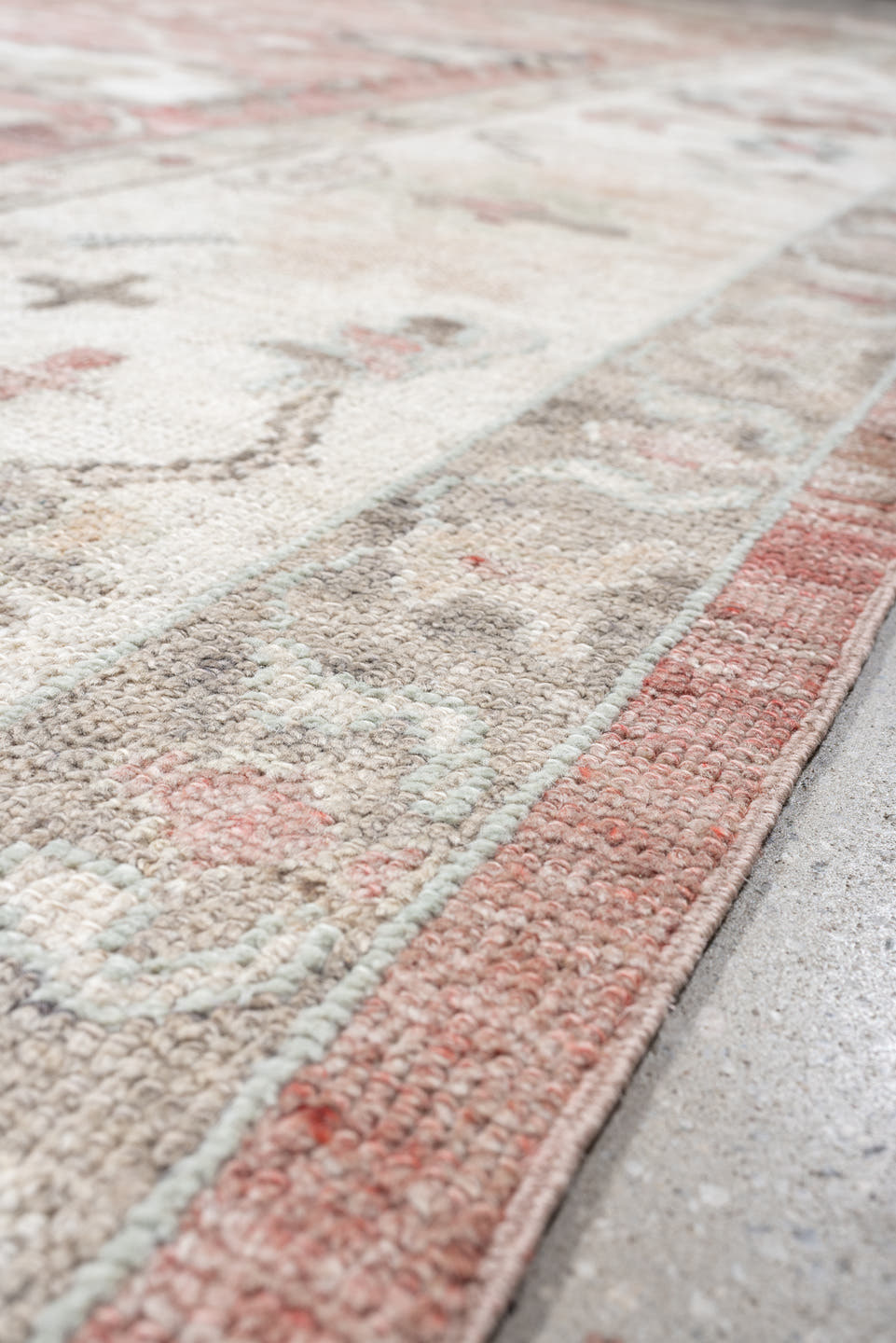 9' x 11' one-of-a-kind handmade vintage Oushak large size rug. Color palette: coral, ivory, sage, taupe, blush, charcoal