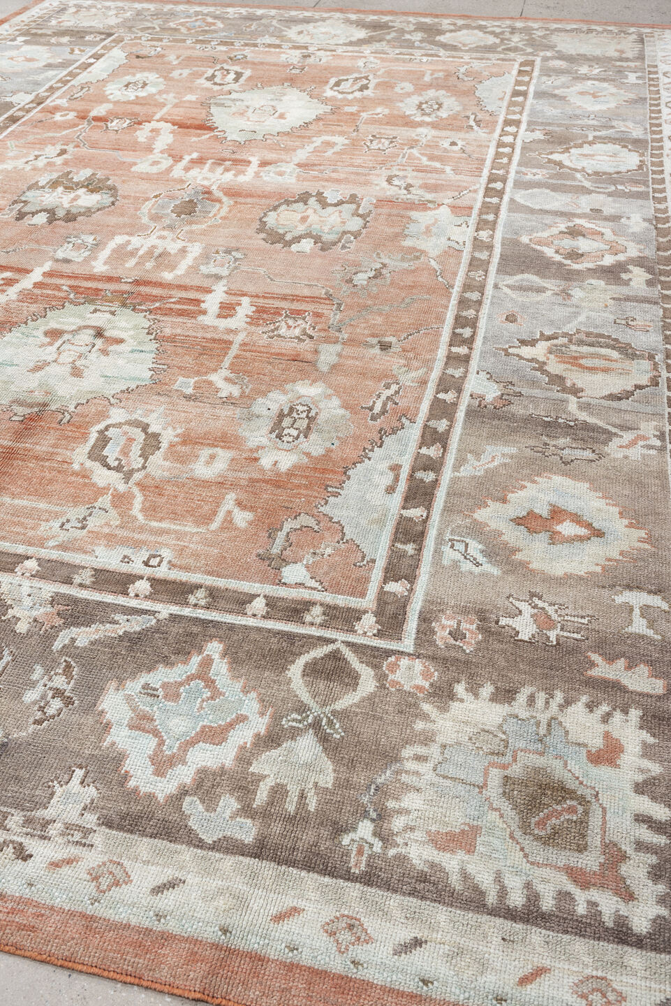 9' x 13' one-of-a-kind handmade vintage Oushak large size rug. Color palette: blush, taupe, ivory, pale blue, peach, sand