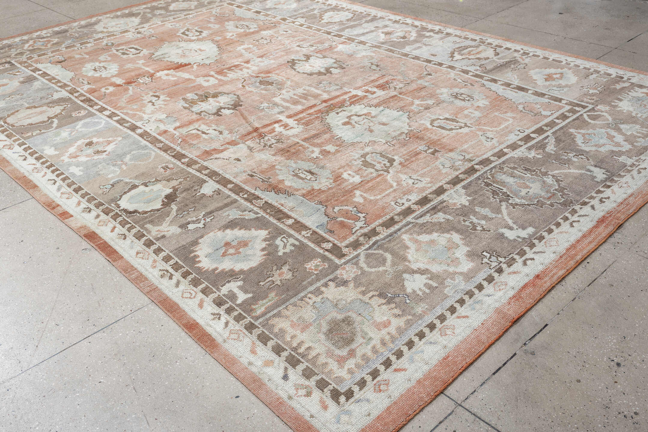 9' x 13' one-of-a-kind handmade vintage Oushak large size rug. Color palette: blush, taupe, ivory, pale blue, peach, sand