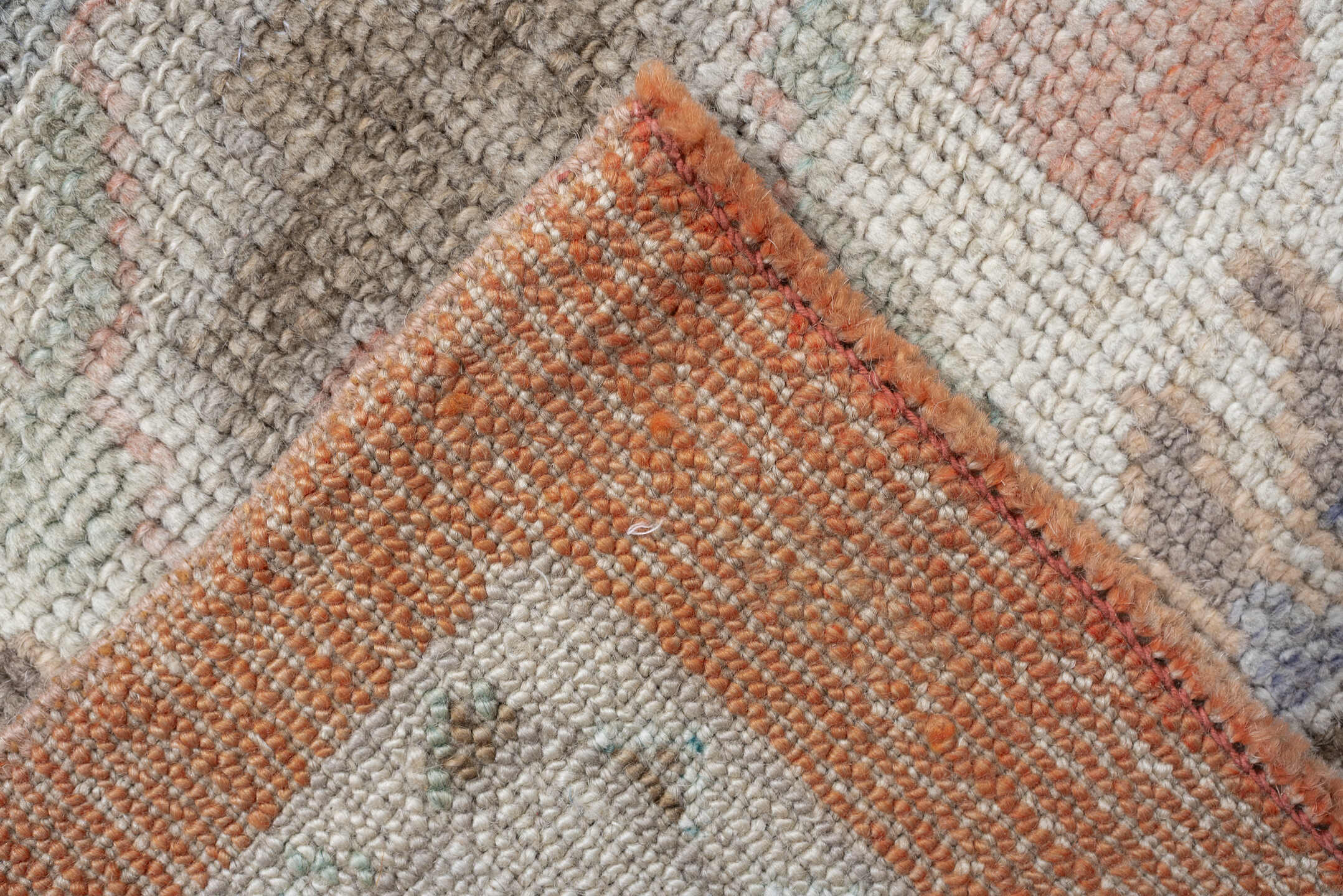 9' x 13' one-of-a-kind handmade vintage Oushak large size rug. Color palette: blush, taupe, ivory, pale blue, peach, sand