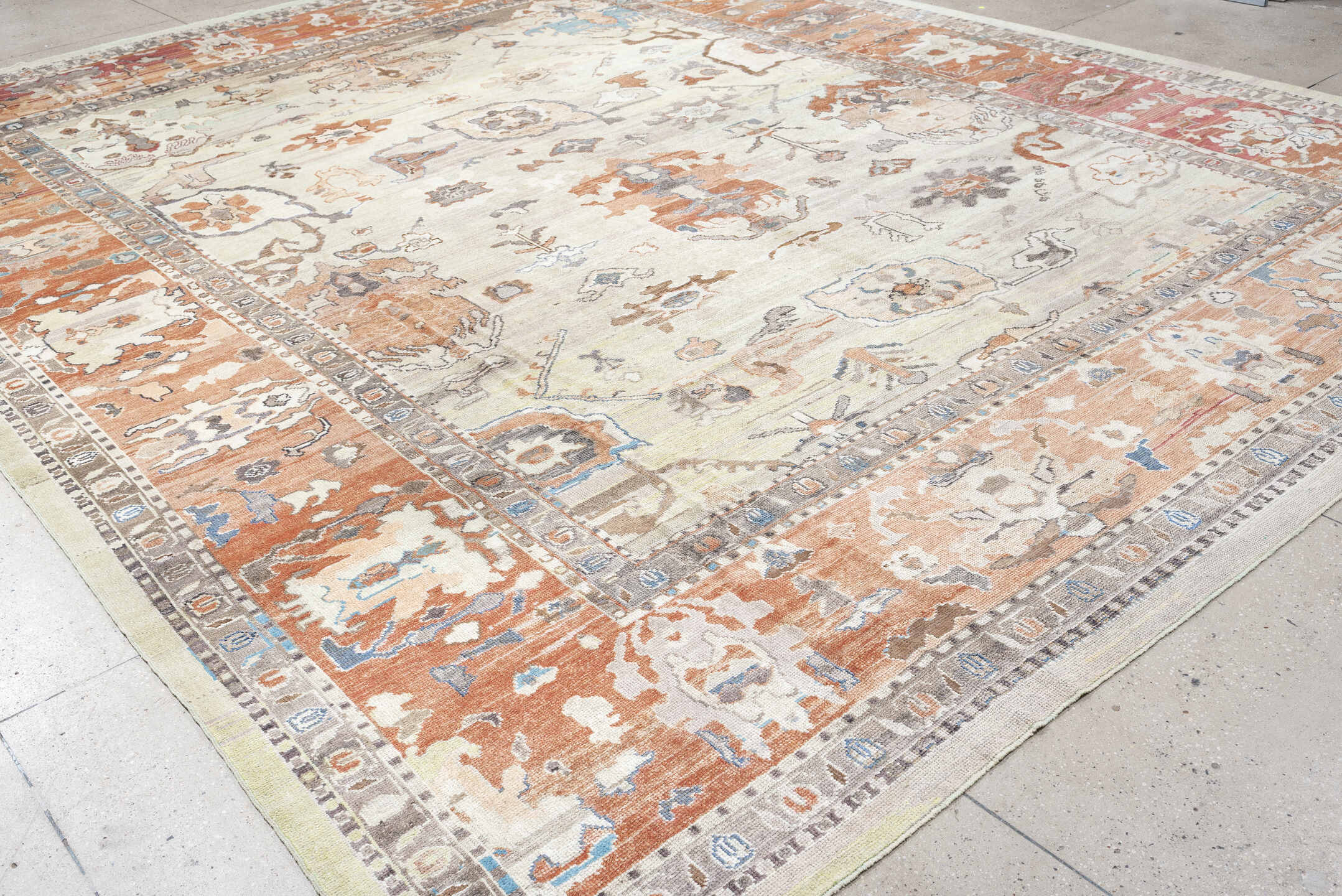 12' x 15' one-of-a-kind handmade vintage Oushak oversize rug. Color palette: ivory, terra cotta, taupe, slate, pale blue