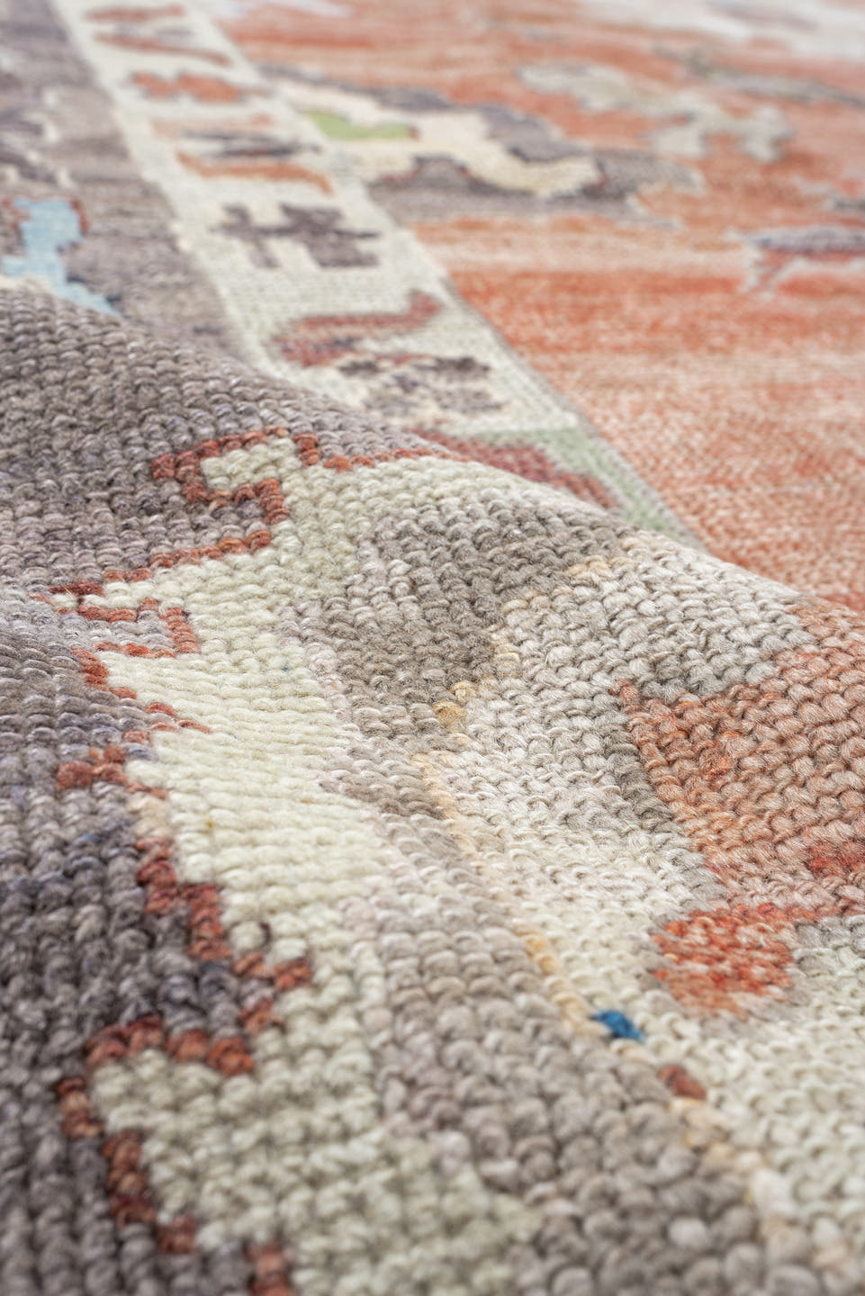 12' x 15' one-of-a-kind handmade vintage Oushak oversize rug. Color palette: coral, slate, ivory, sky blue, sage, taupe