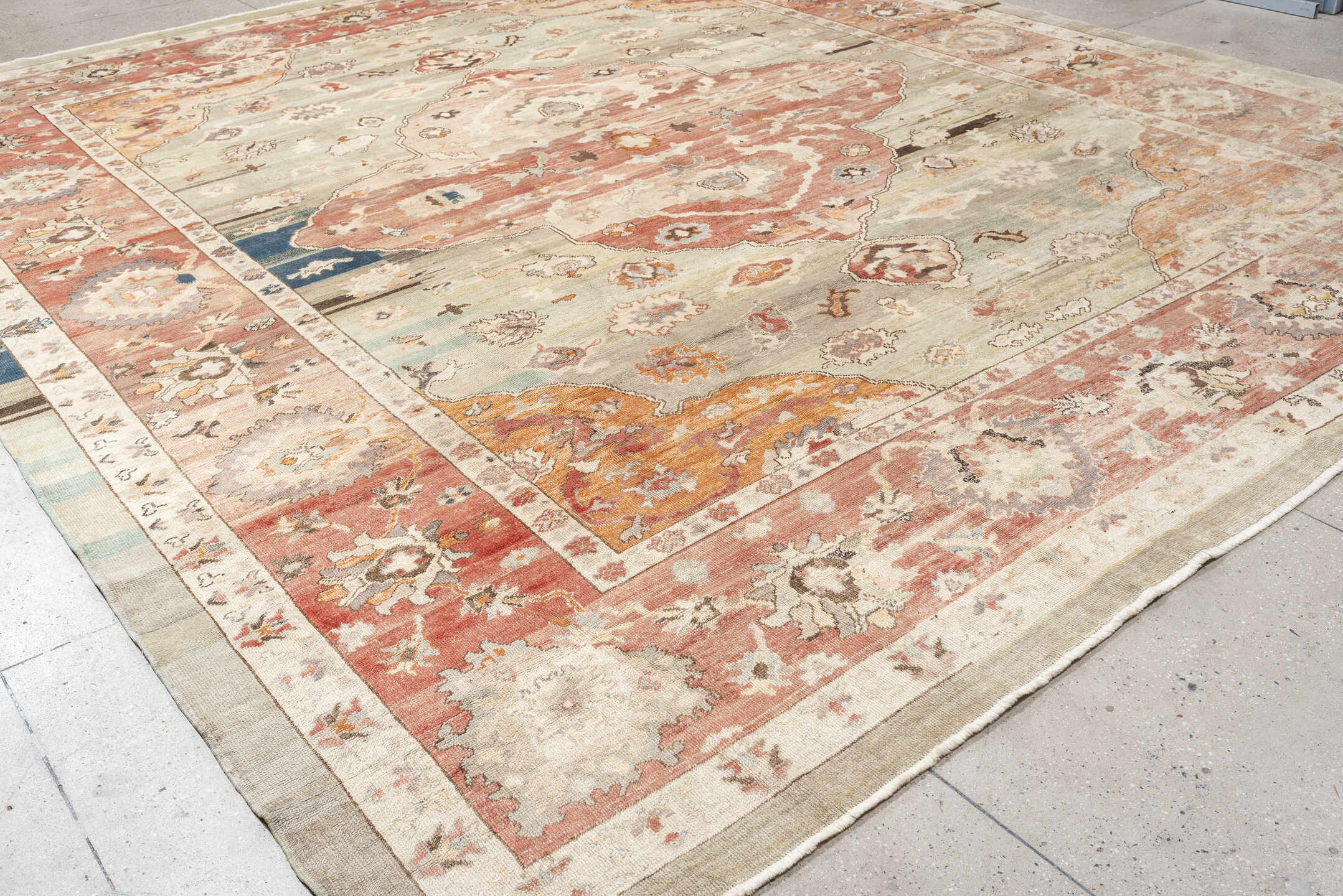 12' x 14' one-of-a-kind handmade vintage Oushak oversize rug. Color palette: sage, coral, ivory, terracotta, taupe, peach