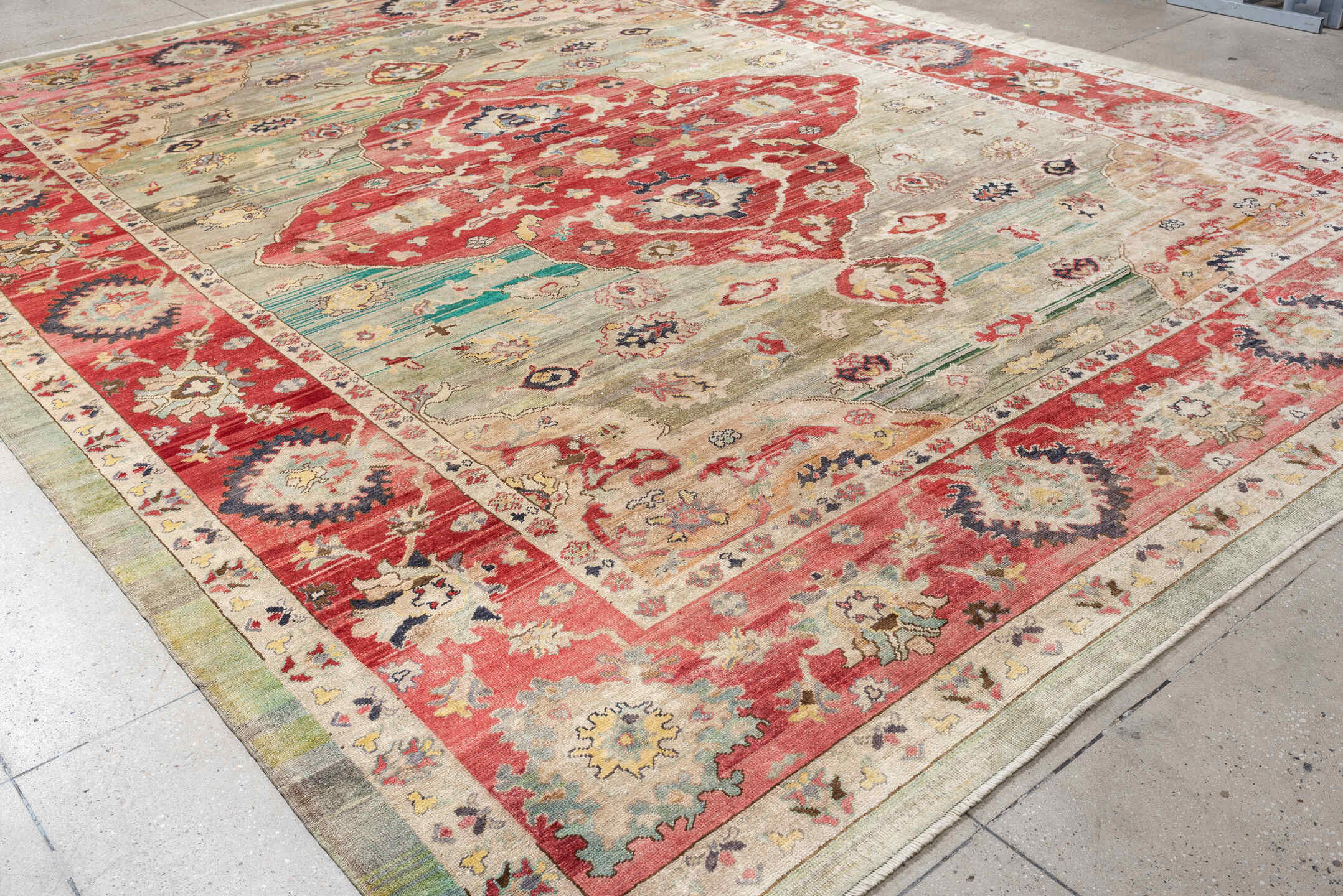 12' x 15' one-of-a-kind handmade vintage Oushak oversize rug. Color palette: terracotta, sage, ivory, rust, cream, navy