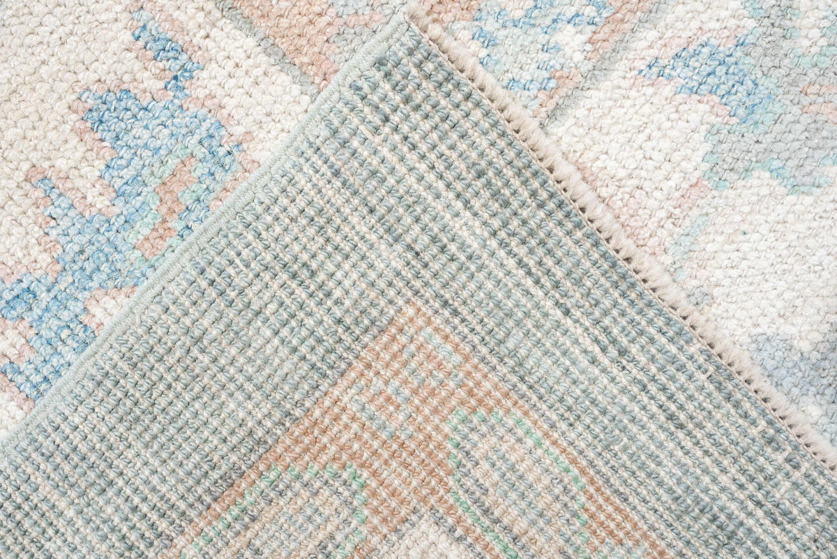 9' x 12' one-of-a-kind handmade vintage Oushak large size rug. Color palette: pale blue, ivory, blush, sage, peach, taupe