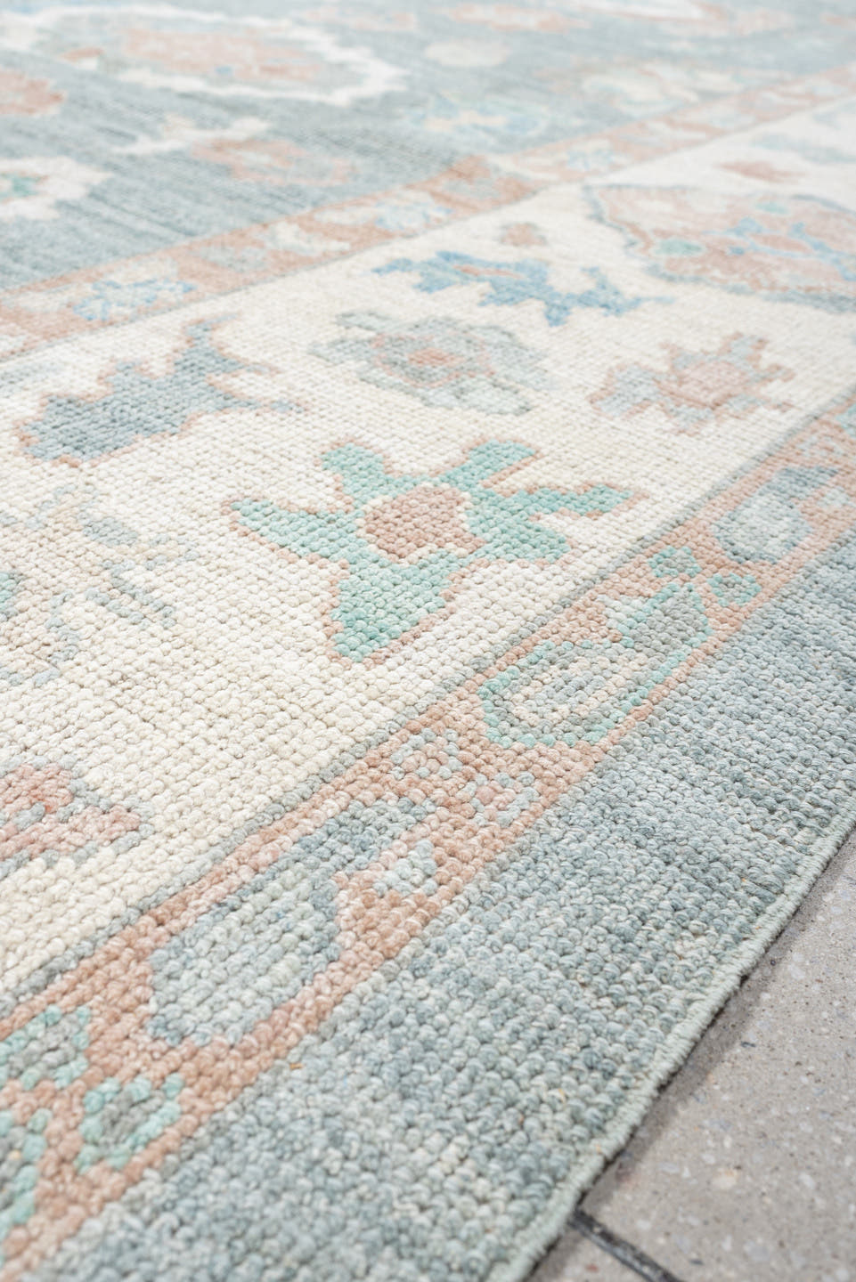 9' x 12' one-of-a-kind handmade vintage Oushak large size rug. Color palette: pale blue, ivory, blush, sage, peach, taupe