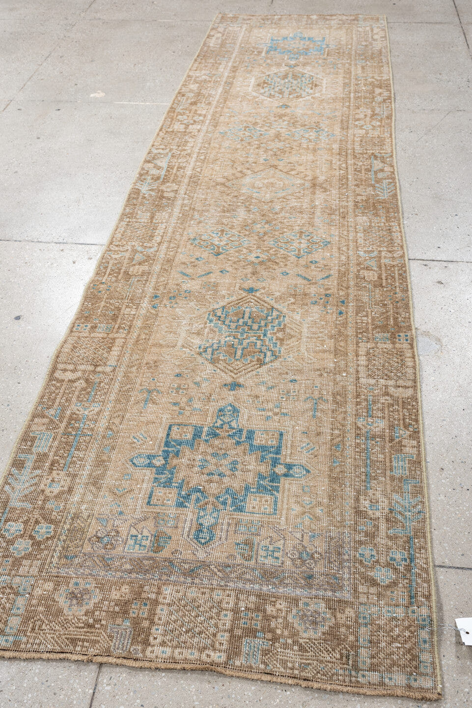 2' x 10' one-of-a-kind handmade antique Sarab runner rug. Color palette: taupe, ivory, sky blue, camel, beige, sand