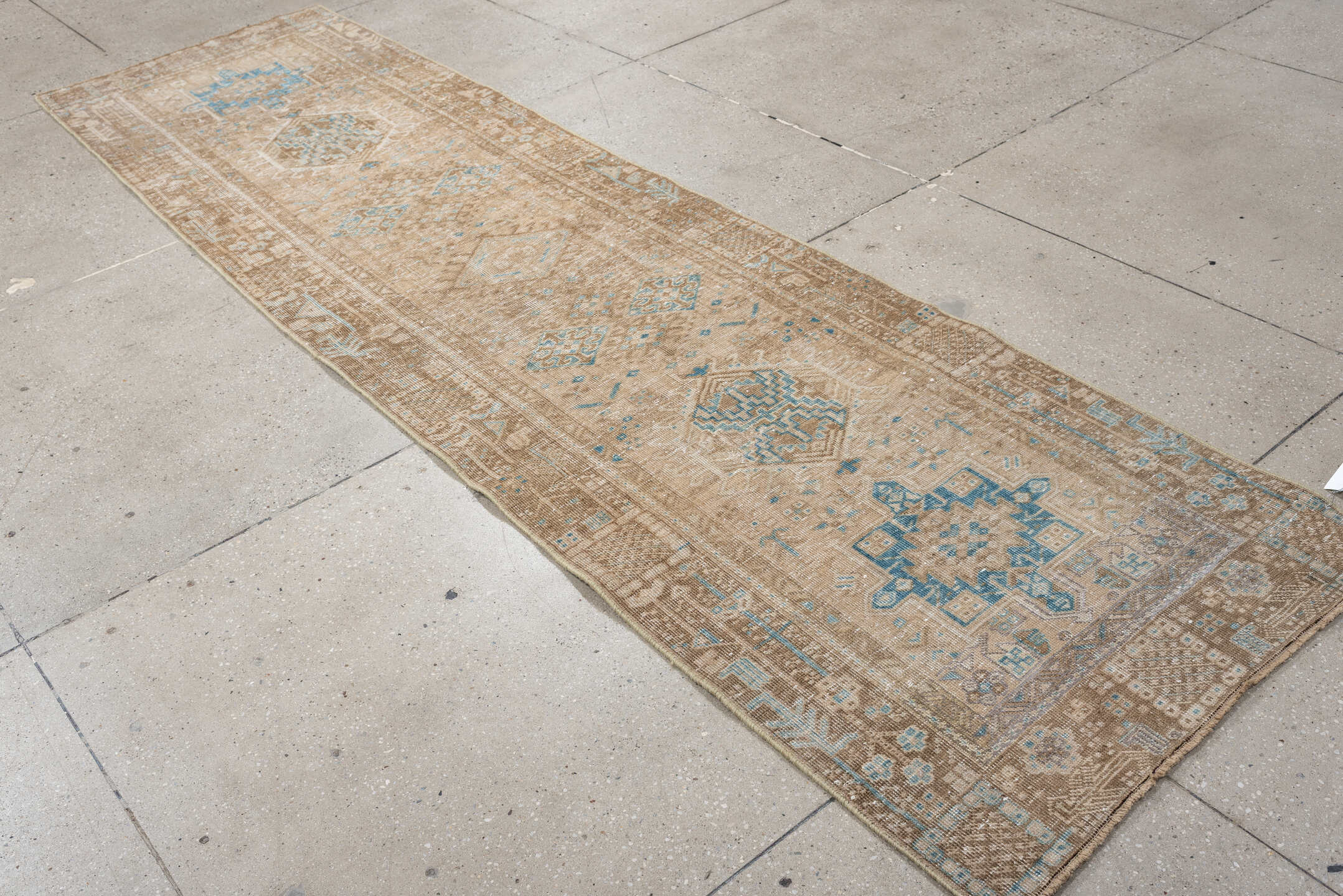 2' x 10' one-of-a-kind handmade antique Sarab runner rug. Color palette: taupe, ivory, sky blue, camel, beige, sand