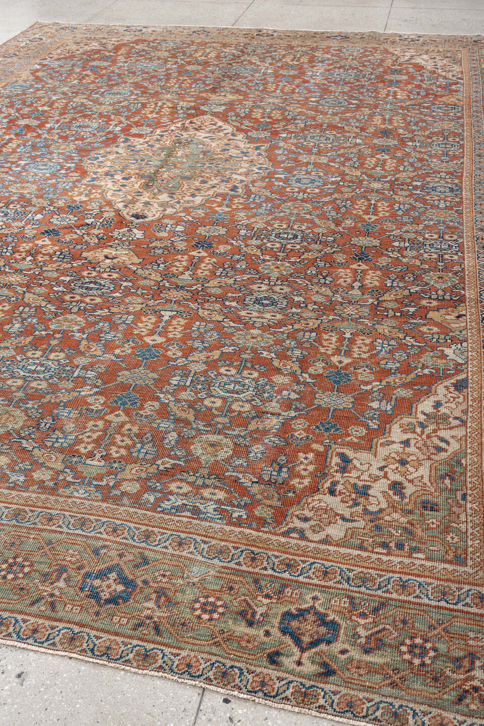 9' x 13' one-of-a-kind handmade antique Mahal large size rug. Color palette: terracotta, ivory, sky blue, navy, sage, taupe