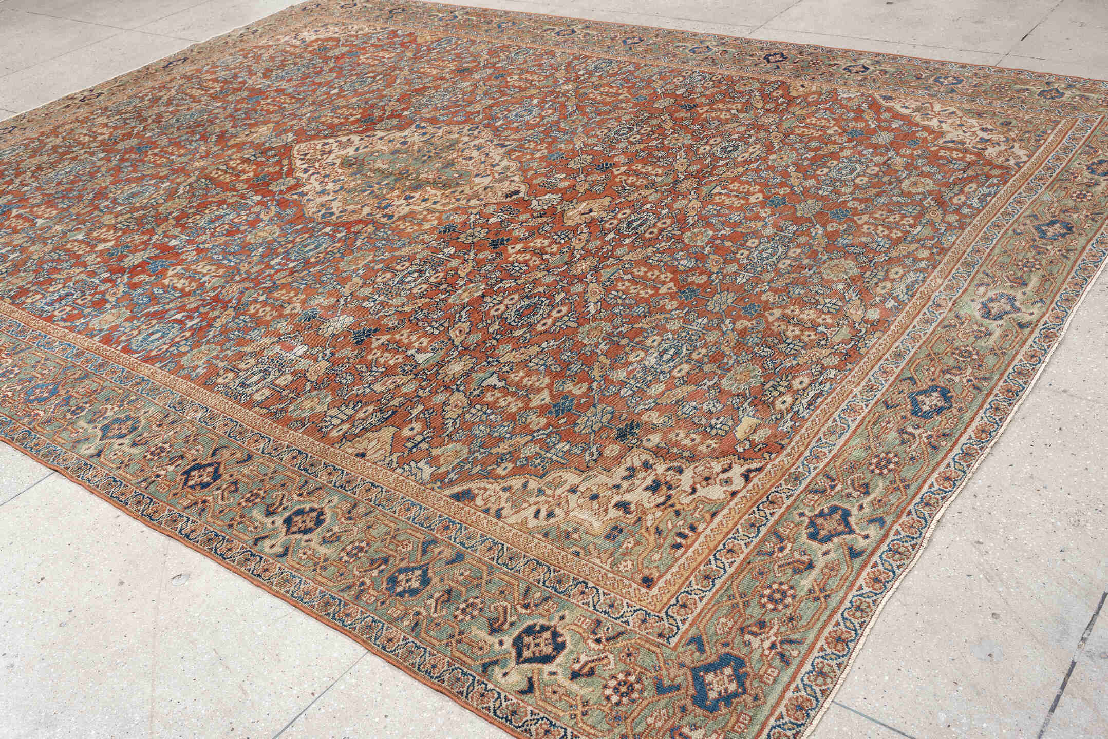 9' x 13' one-of-a-kind handmade antique Mahal large size rug. Color palette: terracotta, ivory, sky blue, navy, sage, taupe