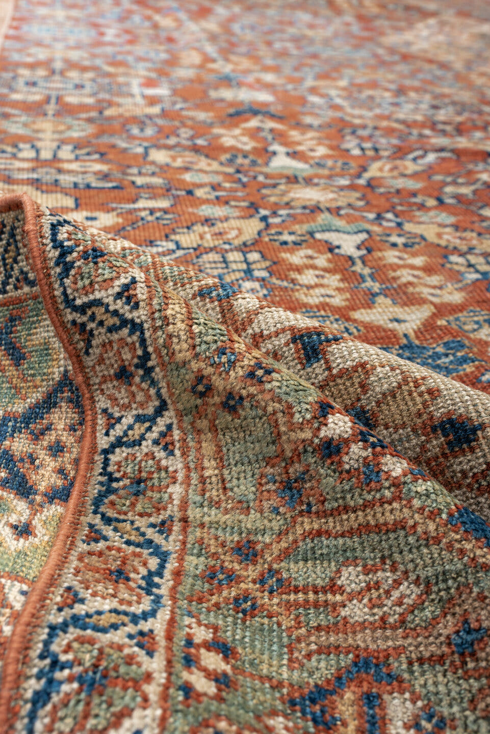 9' x 13' one-of-a-kind handmade antique Mahal large size rug. Color palette: terracotta, ivory, sky blue, navy, sage, taupe