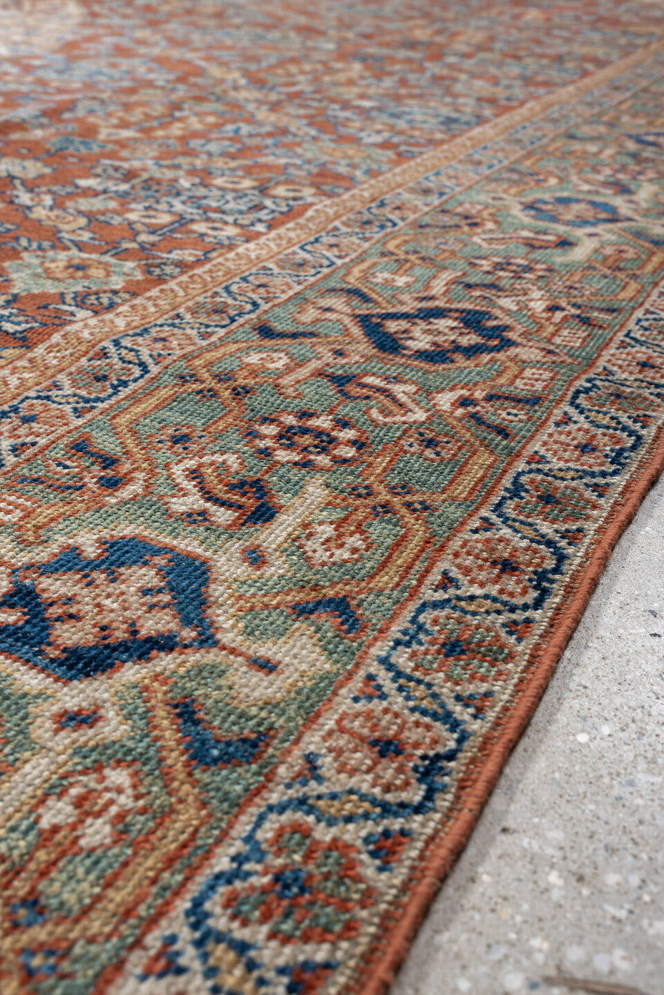 9' x 13' one-of-a-kind handmade antique Mahal large size rug. Color palette: terracotta, ivory, sky blue, navy, sage, taupe
