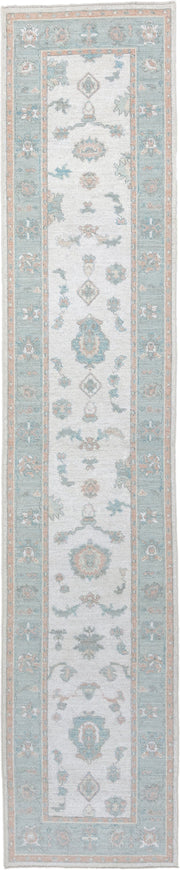 3' x 14' one-of-a-kind handmade vintage Oushak runner rug. Color palette: ivory, aqua, blush, sage, pale blue, taupe, teal